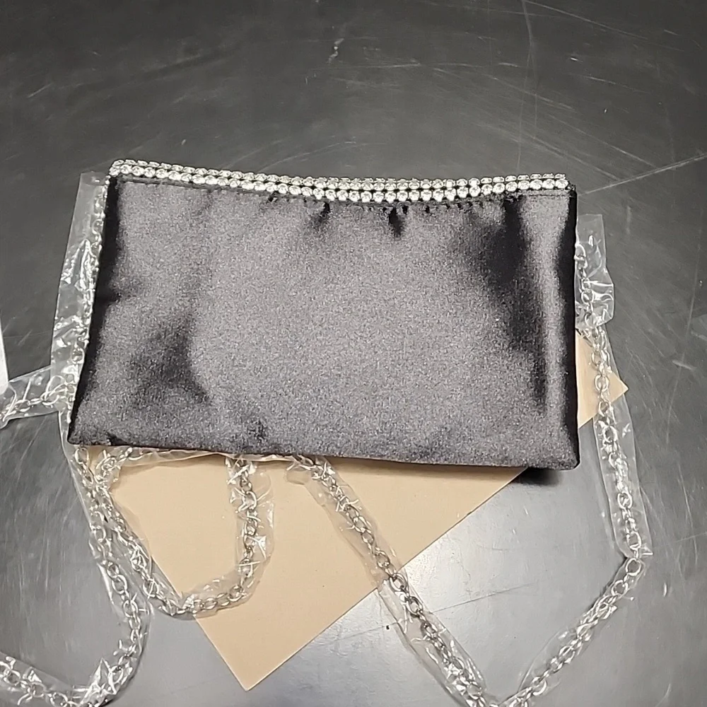 Amber Sceats rhinestone embellished clutch purse with chain strap